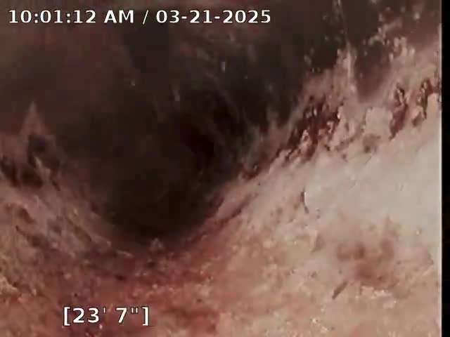 Severely rusted and corroded in-slab air ducts showing damage from long-term ground water intrusion in Lake Zurich, Illinois.