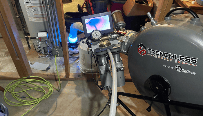 Trenchless sewer lining equipment setup for 50 foot UV CIPP repair in St. Charles IL